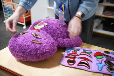 Meebie Has Feelings toy being given an expression to represent an emotional state.